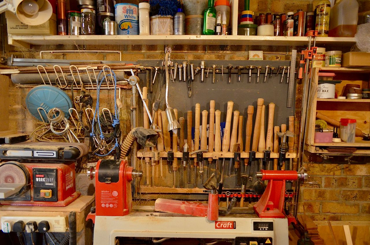 The Art of Drawing Readers In: Your attractive post title goes here A well-organized woodworking workshop with various tools and equipment neatly arranged.