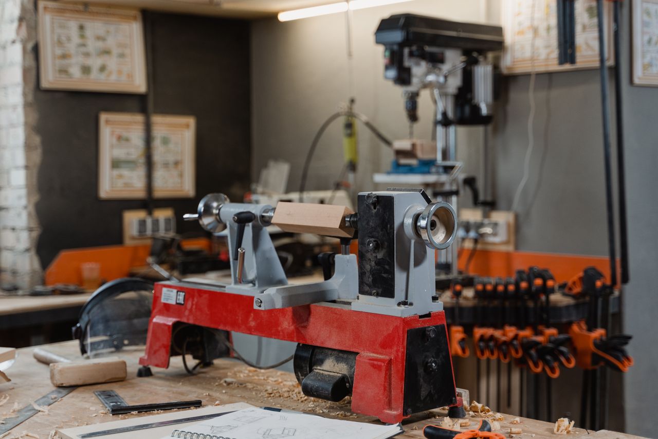 Crafting Captivating Headlines: Your awesome post title goes here A well-equipped woodworking workshop with a lathe and tools on the workbench.
